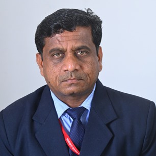 Dr. Devendra Muzalda